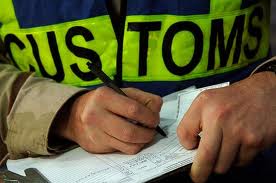 "Customs" in Spanish is "Aduana"