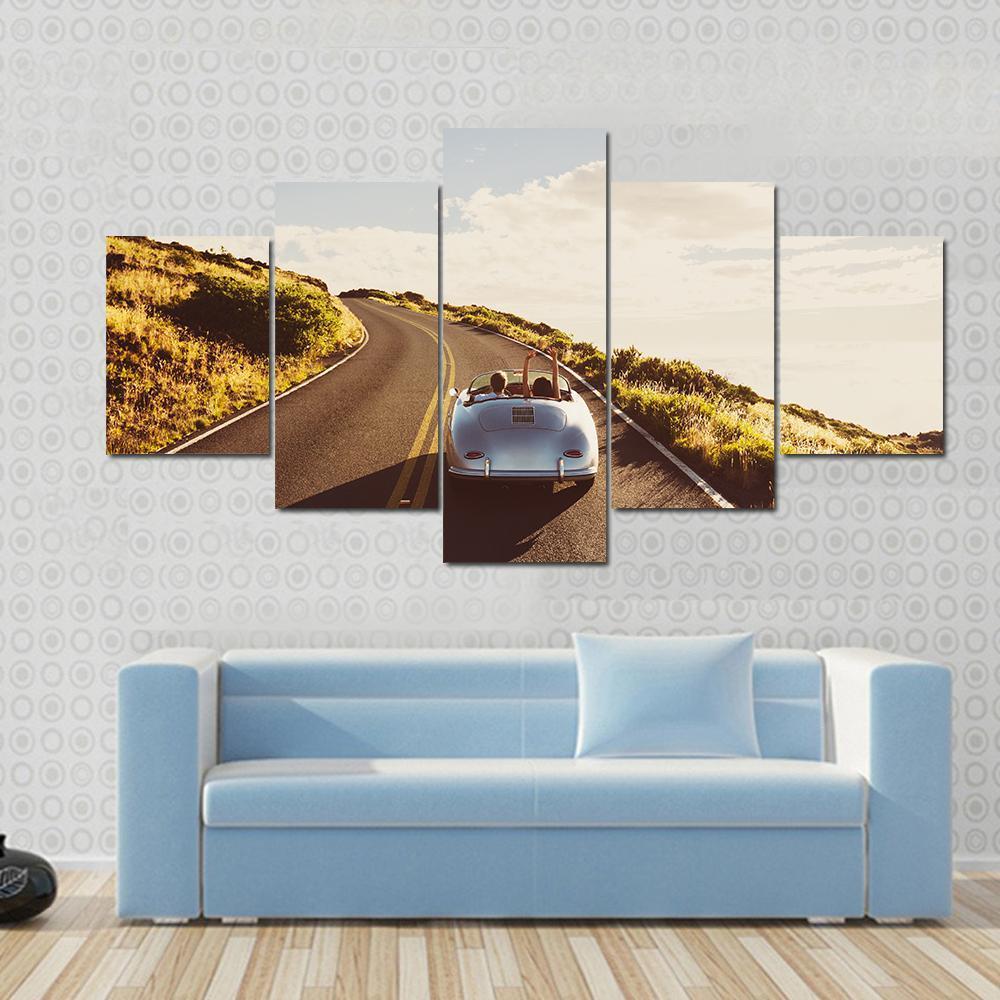 Happy Couple Driving On Country Road In Classic Vintage Sports Car - Automative 5 Panel Canvas Art Wall Decor Happy Couple Driving On Country Road In Classic Vintage Sports Car - Automative 5 Panel Canvas Art Wall Decor